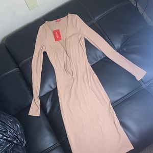 Tan long sleeve fitted dress in an XS.